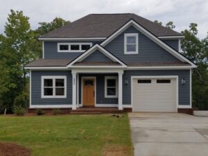 A beautiful house with windows and a garage