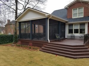 A house with a screened in porch.