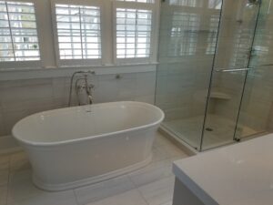 A beautiful bathtub with white interiors